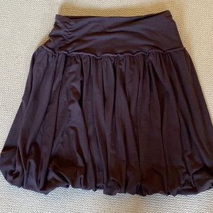 Two skirts one brown one black size M by LUX($25 for two skirts )
